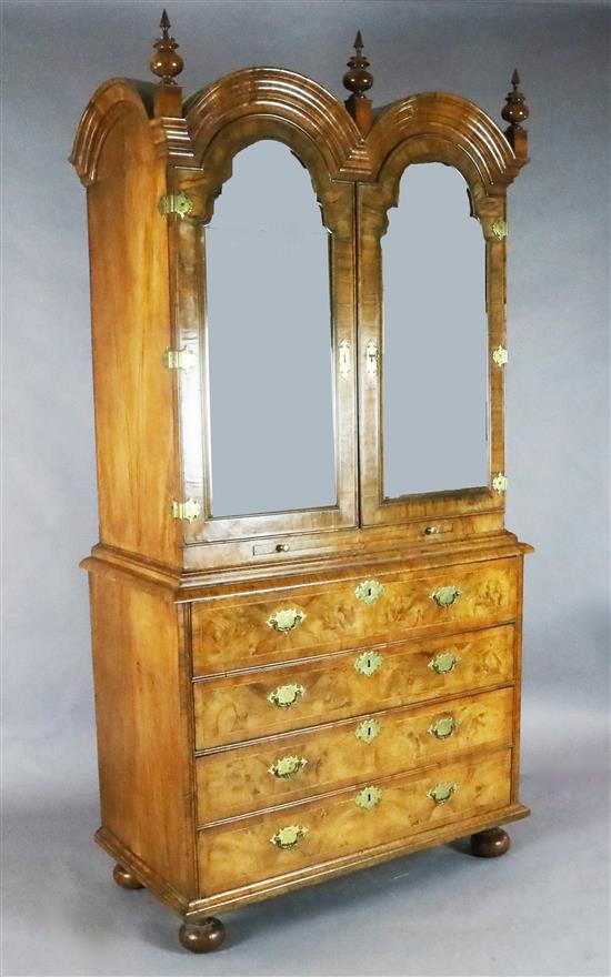 An early 18th century walnut double dome top secretaire cabinet, W.3ft 7in. D.1ft 10in. H.7ft 1in.